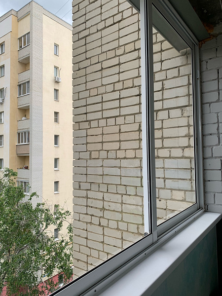 Остекление балкона раздвижными профилями Alumil фото 1